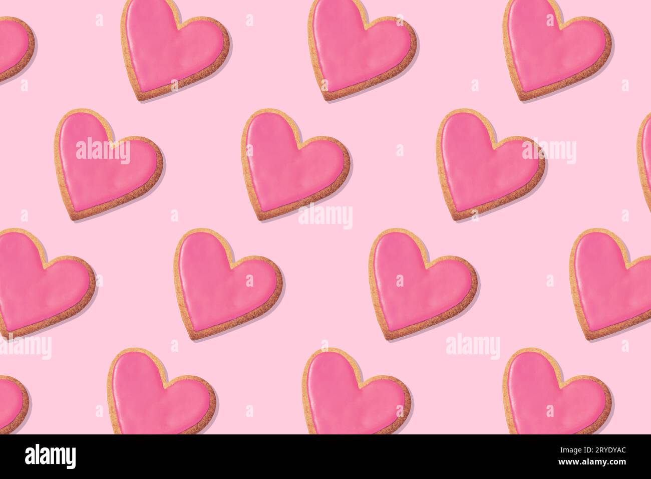 Hintergrundmuster herzförmiger Kekse Stockfoto