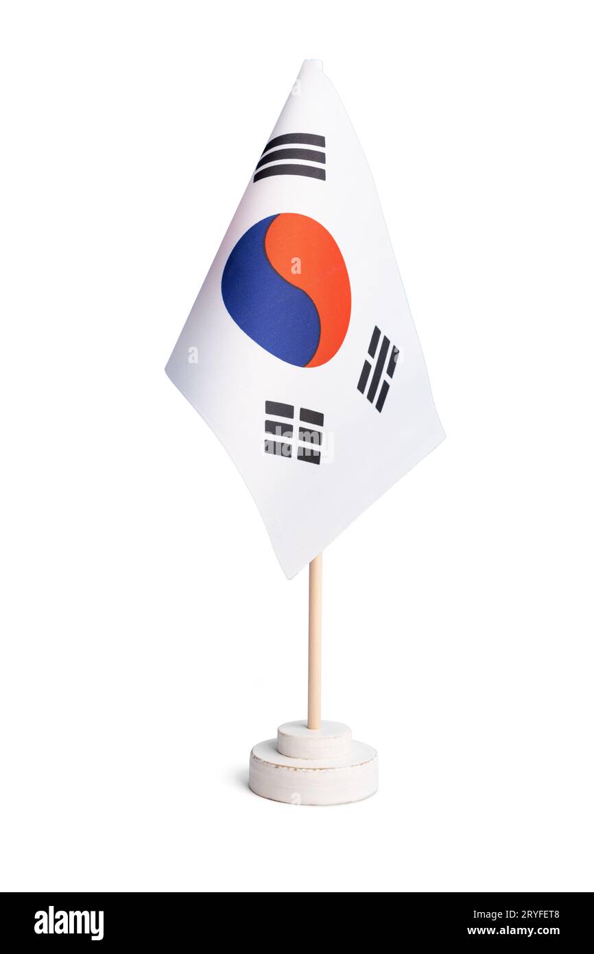 Kleine Tischflagge von Südkorea isoliert auf weißem Hintergrund Stockfoto