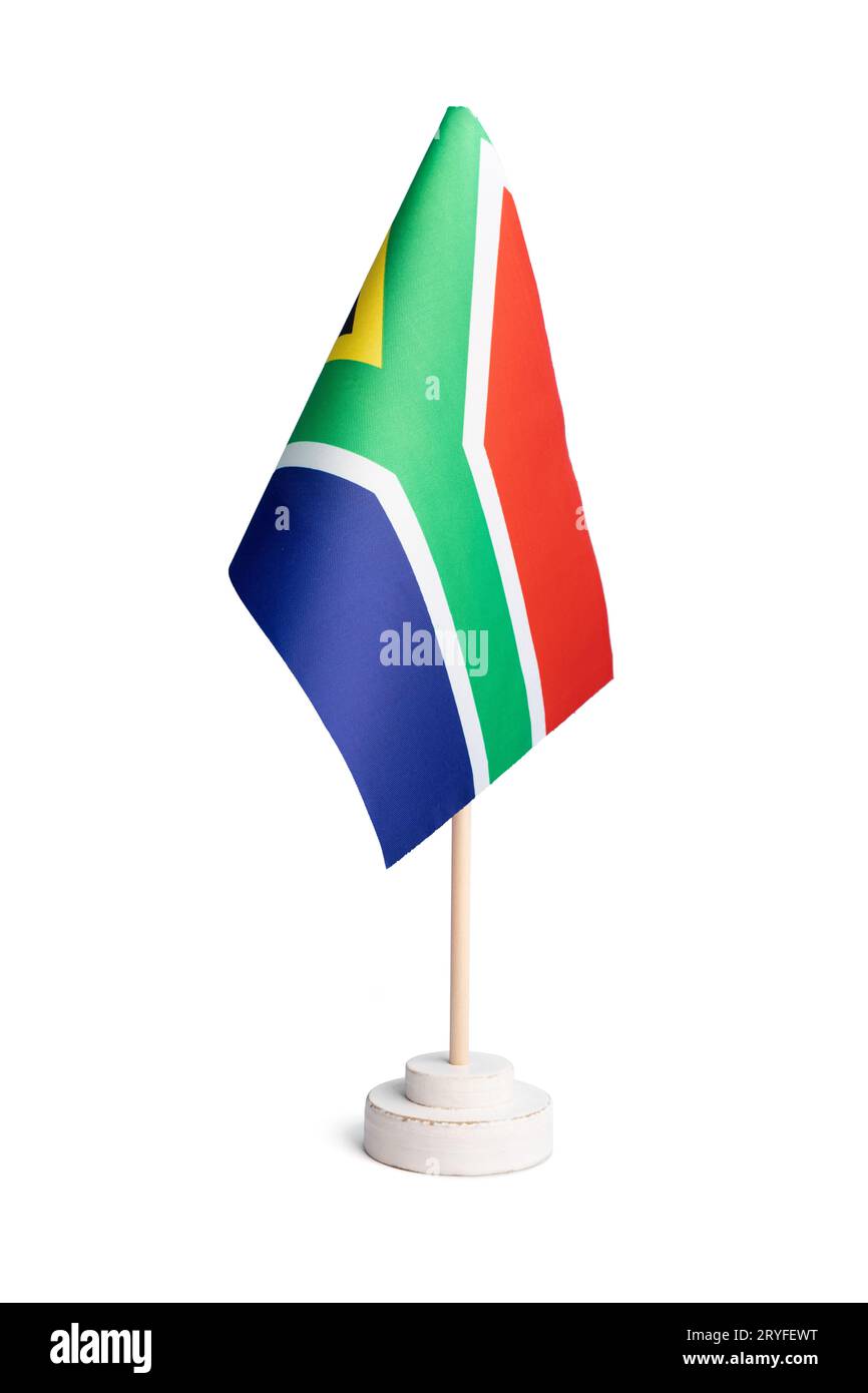 Kleine Tischflagge Südafrikas isoliert auf weißem Hintergrund Stockfoto