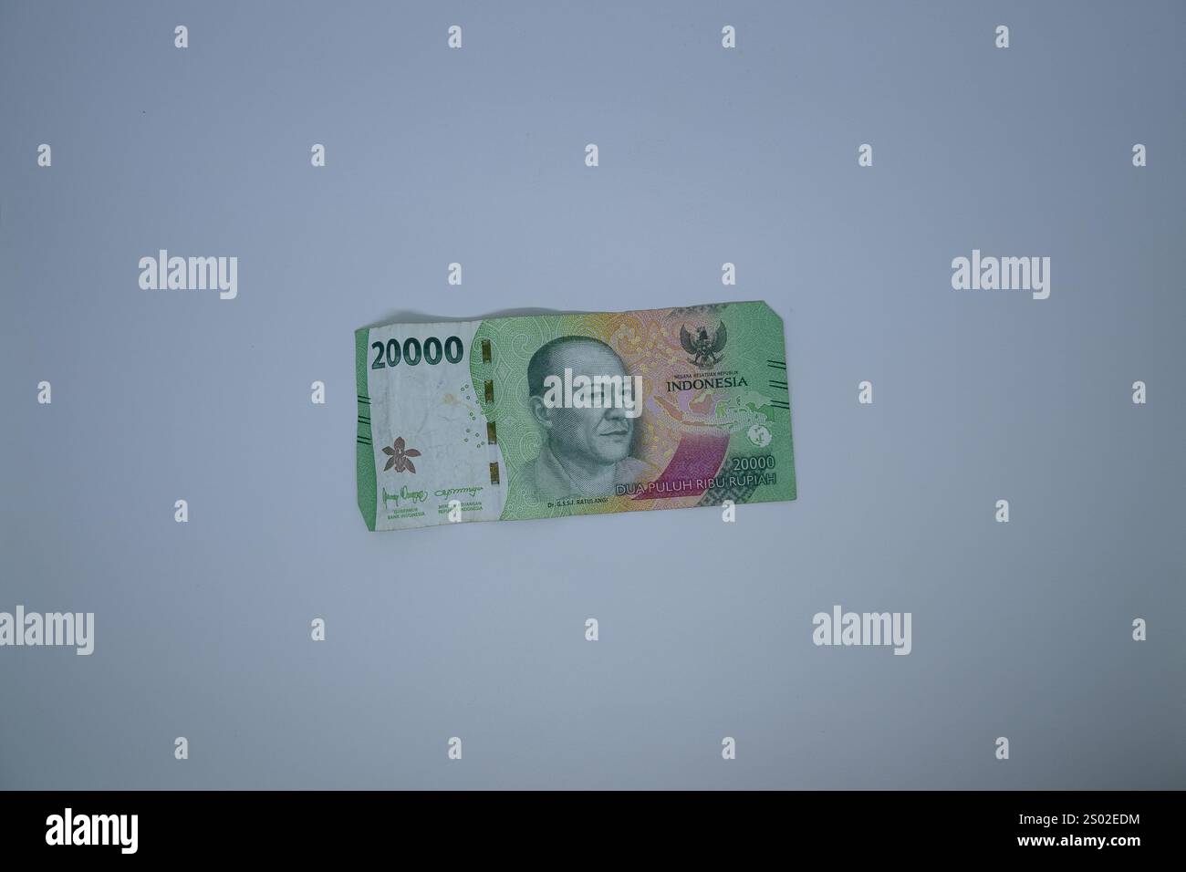 EID-Banknoten und -Münzen aus der Währung der Republik Indonesien Stockfoto