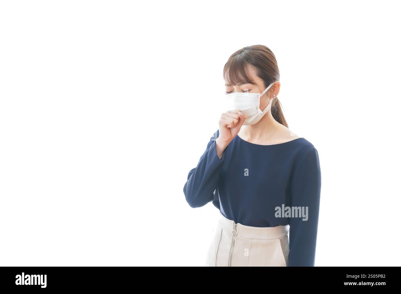 Junge Geschäftsfrau mit Hustensymptomen Stockfoto