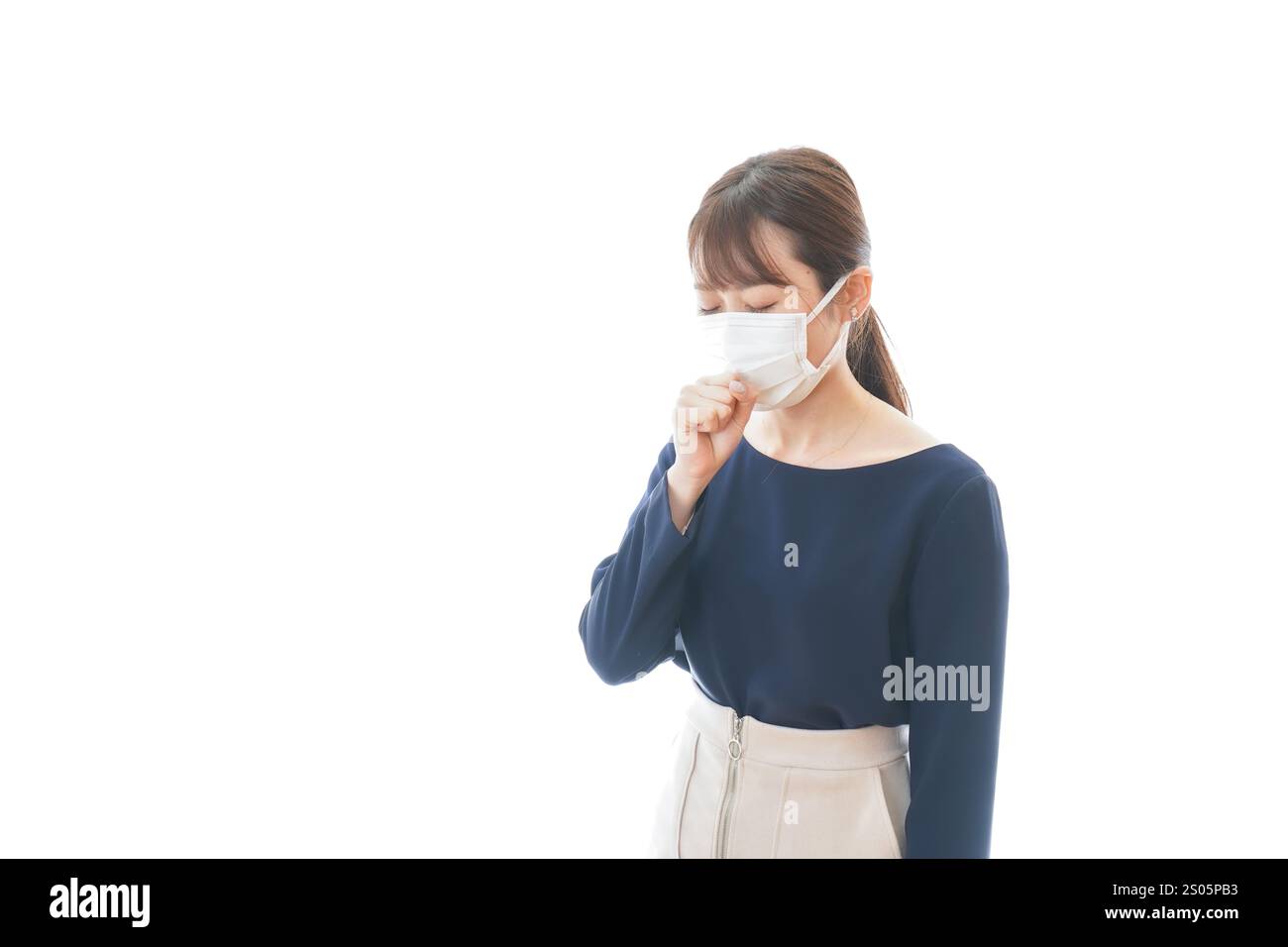 Junge Geschäftsfrau mit Hustensymptomen Stockfoto