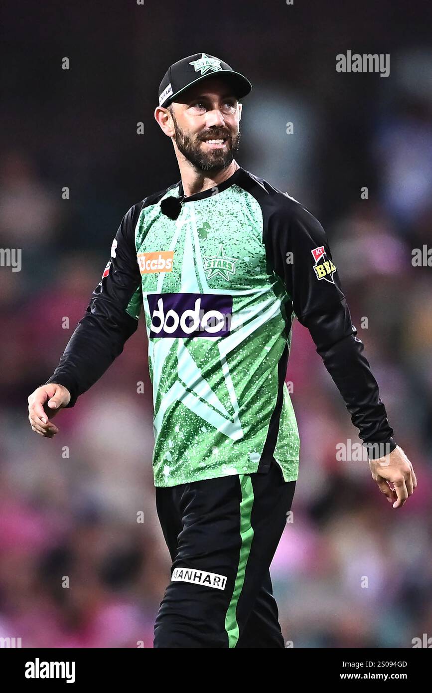 Sydney, Australien. Dezember 2024. Glenn Maxwell von den Melbourne Stars sieht beim Big Bash League Spiel zwischen den Sydney Sixers und den Melbourne Stars auf dem Sydney Cricket Ground zu. Die Sydney Sixers gewinnen ihr Spiel in der Big Bash League gegen die Melbourne Stars auf dem Sydney Cricket Ground mit 8 Wickets (11 Bälle übrig). Melbourne Stars: 194/9 (20 Overs), Sydney Sixers 198/2 (18,1 Overs). Quelle: SOPA Images Limited/Alamy Live News Stockfoto