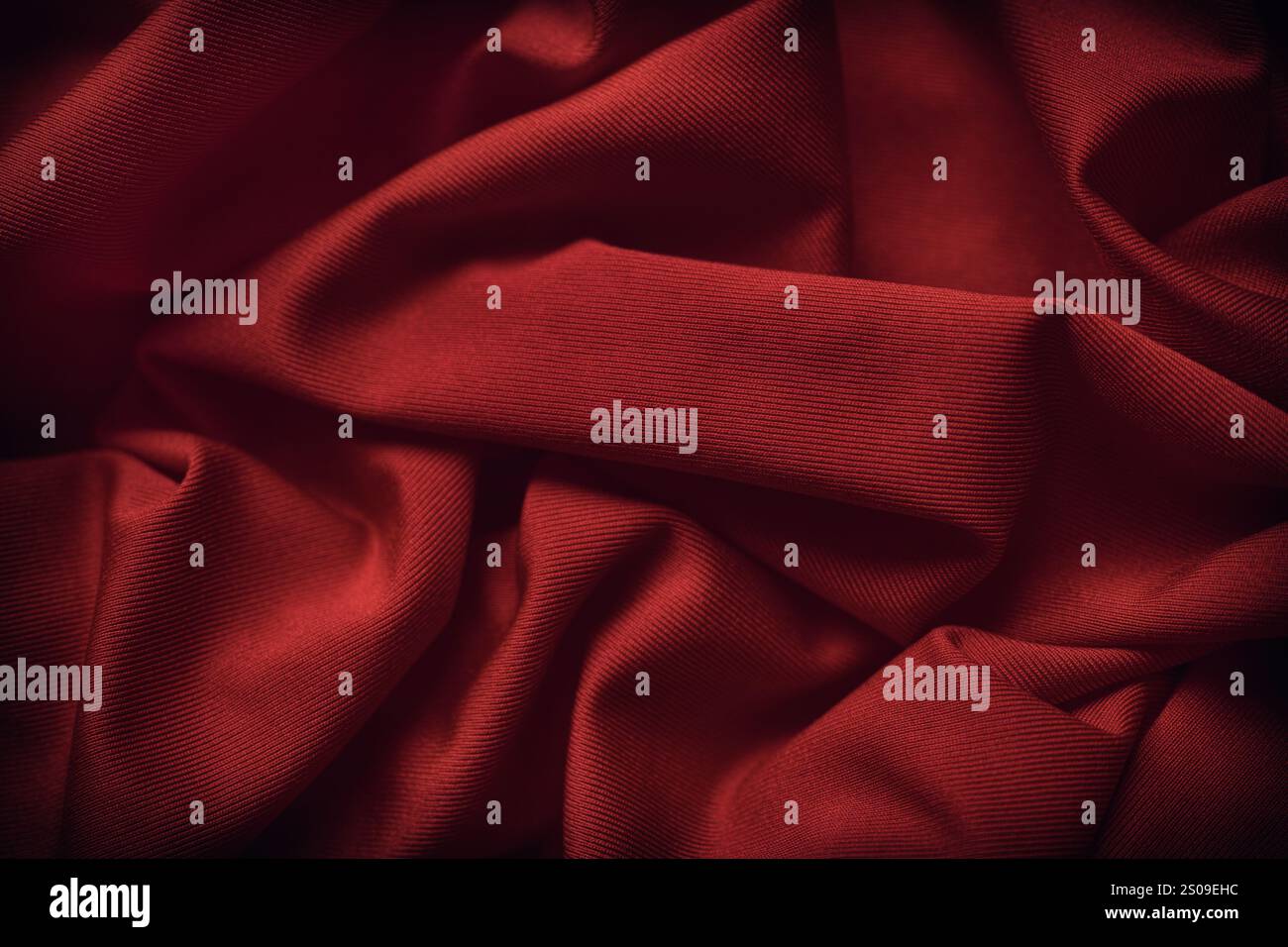 Ein dunkelroter Texturhintergrund. Nahaufnahme. Stockfoto