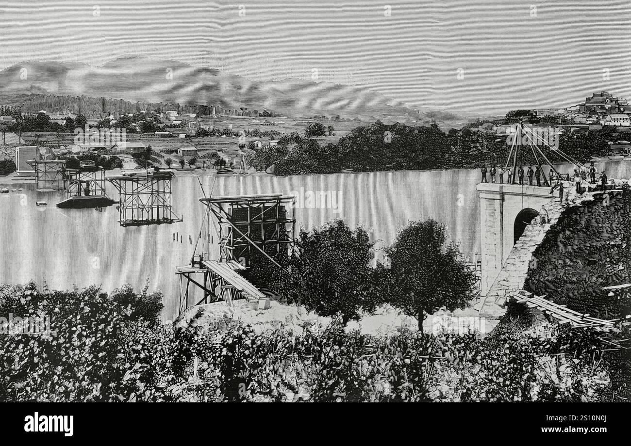 Geschichte Spaniens. Galicien. Provinz Pontevedra. TUI International Bridge über den Fluss Mino. Sie wurde von dem Ingenieur Pelayo Mancebo y Agreda (1845–1912) entworfen. Die Bauarbeiten begannen 1884 und wurden am 25. März 1886 offiziell eröffnet. Sie stellte eine Verbindung zwischen den Städten Tui (Spanien) und Valenca do Mino (Portugal) her. Zustand der Mauerwerke zu Beginn der Fundamentation der Säulen. Stich von Bernardo Rico. La Ilustracion Espanola y Americana (die spanische und amerikanische Illustration), 8. März 1884. Stockfoto