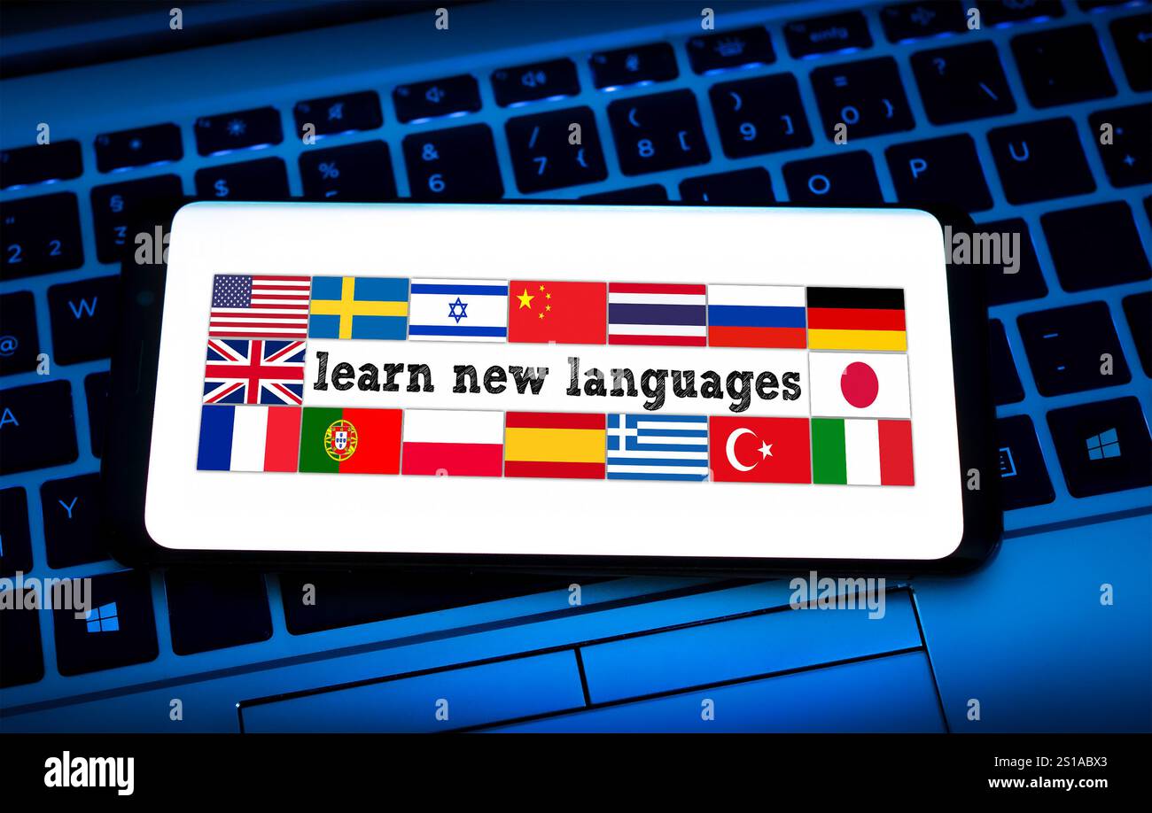 Lernen Sie neue Sprachen – auf dem Smartphone angezeigter Schriftzug Stockfoto