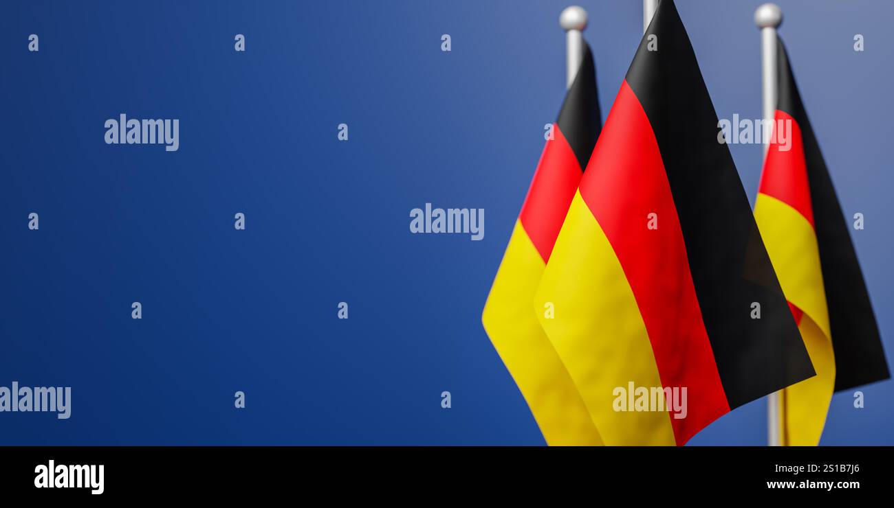 Flaggen von Deutschland vor blauem Hintergrund. Selektiver Fokus auf Frontflagge. Kopieren Sie den Platz nach links Stockfoto Flaggen von Deutschland vor blauem Hintergrund. Selektiver Fokus auf Frontflagge. Kopieren Sie den Platz nach links Stockfoto