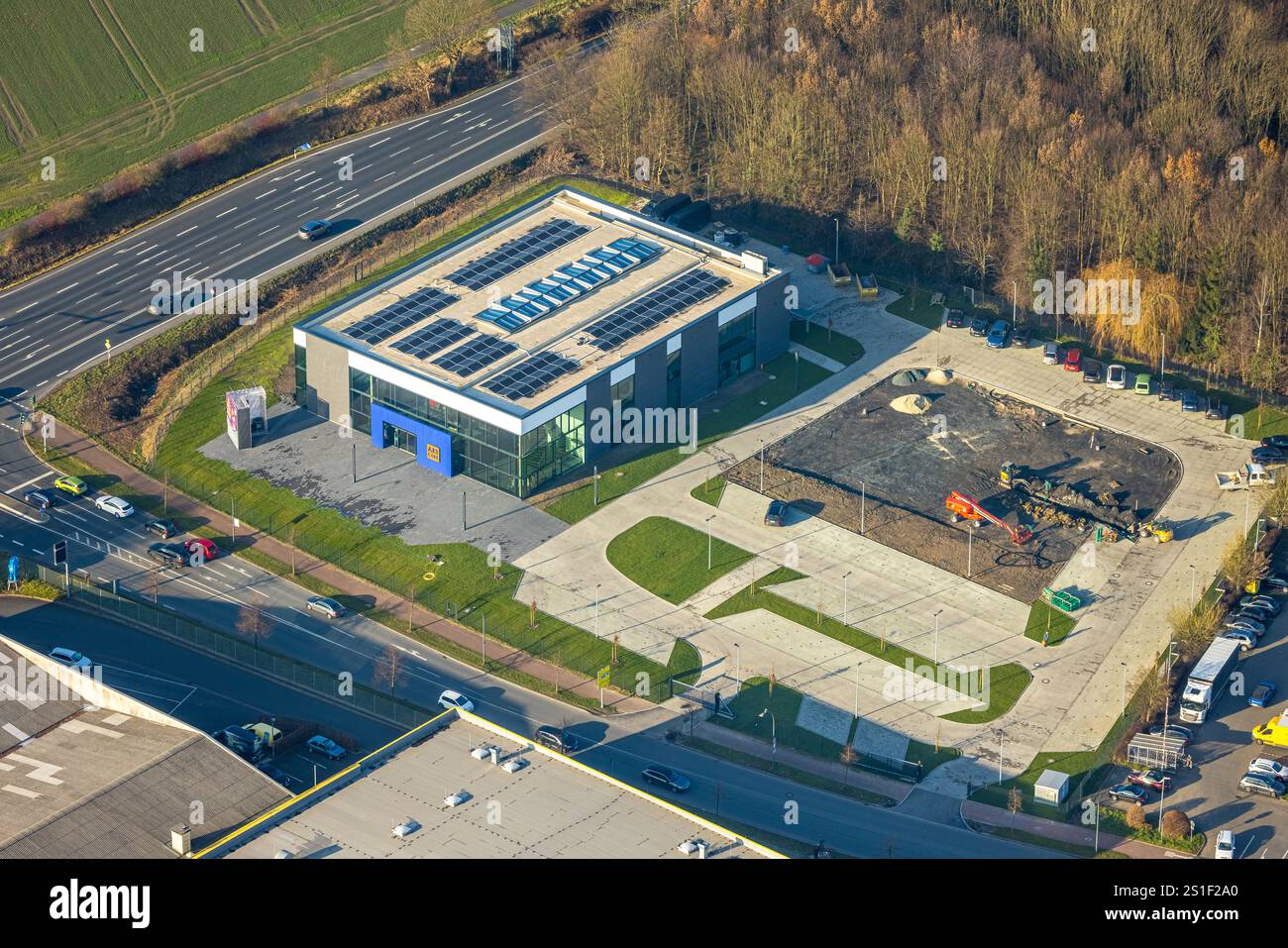 Luftansicht, Baustelle mit Neubau der Mensing Galerie an der Ecke Werler Straße/Unnaer Straße, Rhynern, Hamm, Ruhrgebiet, Stockfoto