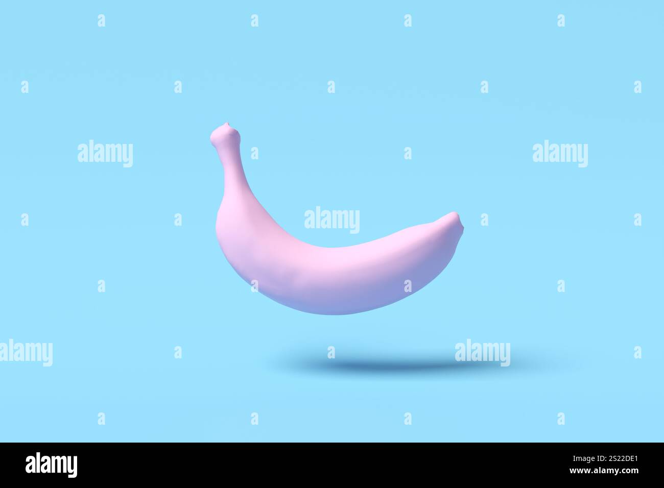 Surreales Bild einer rosafarbenen Banane auf blauem Hintergrund, die eine trendige Ästhetik mit einem Hauch von Farbkontrasten schafft. Perfekt für Lebensmittelfotografie A Stockfoto