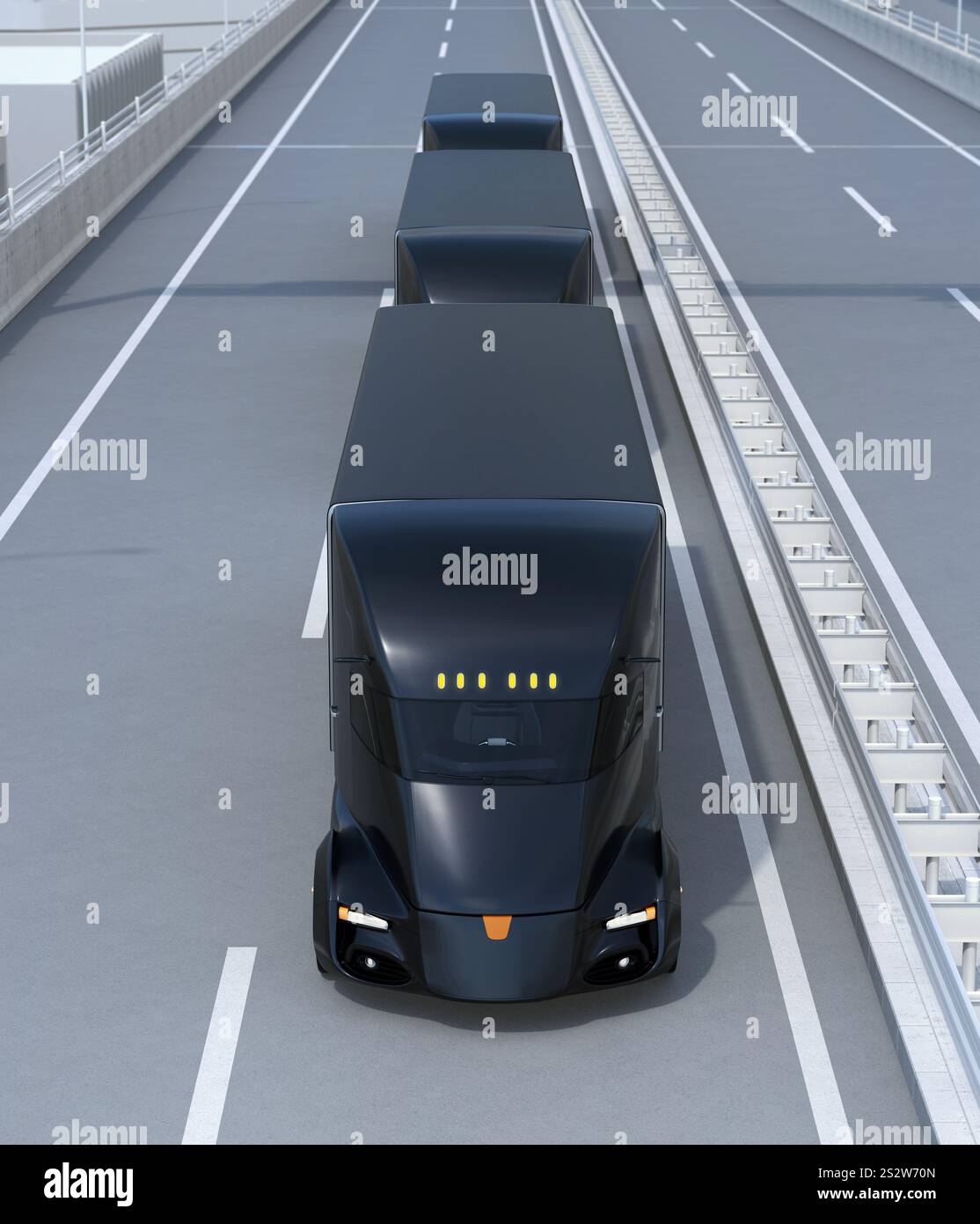 Schwarzer selbstfahrender Elektrostapler, der parallel auf einer Autobahn fährt Stockfoto