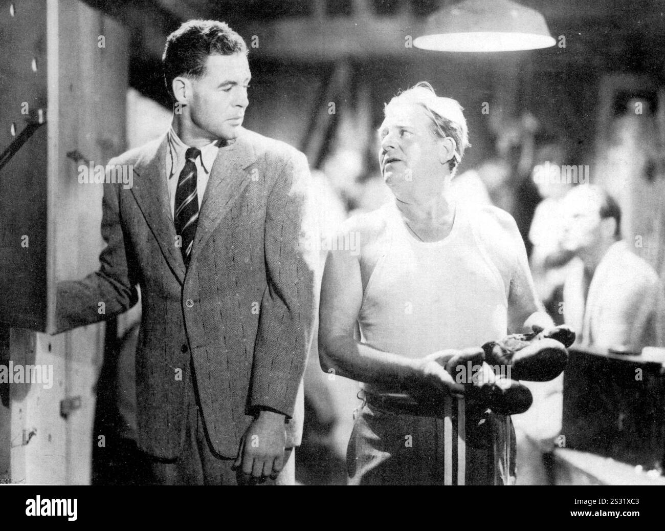 DIE EINRICHTUNG ROBERT RYAN, WALLACE FORD Datum: 1949 Stockfoto