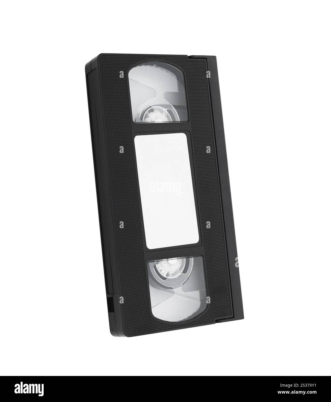 Altes VHS-Videokassettenband mit leerem Etikett für Copyspace. Altes Videokassettenband mit leerem Etikett Stockfoto