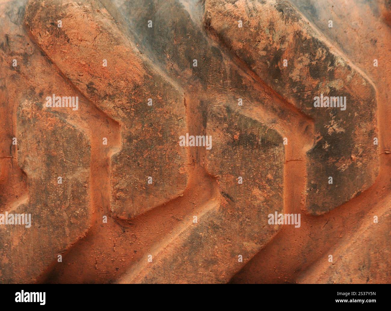 Großer Hauch von Traktorhintergrund oder Textur. Großer Schlepper Stockfoto