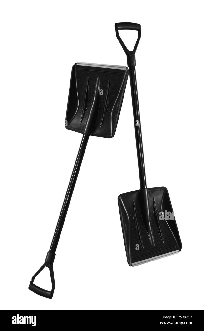 Schneeschaufeln isoliert auf weißem Hintergrund. Schneeschaufeln Stockfoto