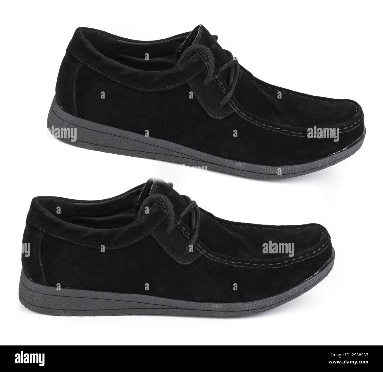 Neue schwarze Schuhe auf weißem Hintergrund. Neue schwarze Schuhe Stockfoto