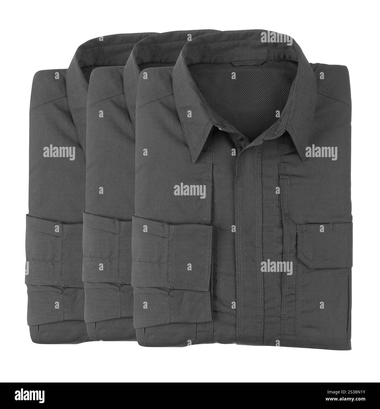 Stapeln Sie bunte Hemden auf weißem Hintergrund. Stapeln Sie bunte Shirts Stockfoto