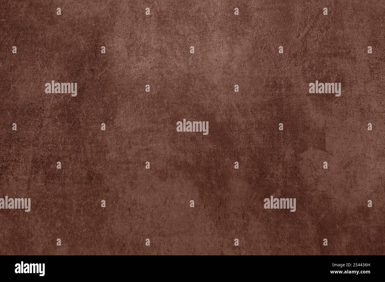 Braune Materialoberfläche mit dezenten Distress-Markierungen, inspiriert von Pantone Mocha Mousse 2025. Stockfoto