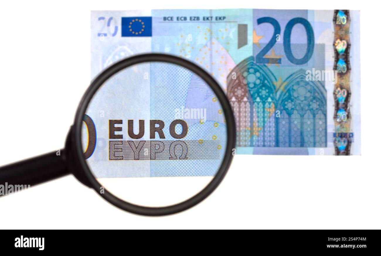 Vergrößerungsglas Lupe Zoom Banknote isoliert auf weißem Hintergrund Stockfoto