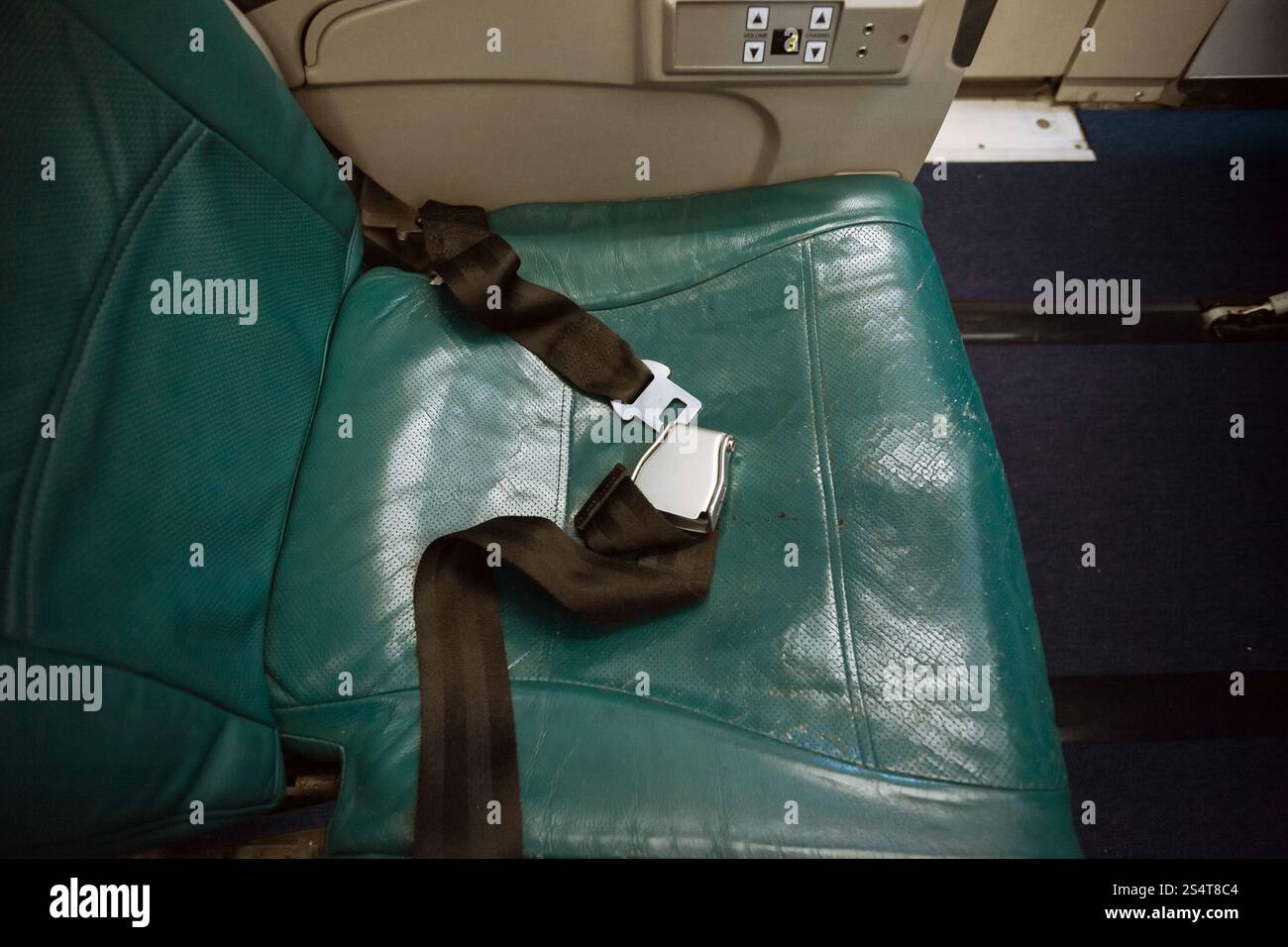 Closeup Schuss löste Gürtel auf Sitz im Flugzeug Stockfoto