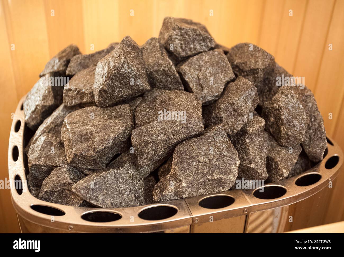 Nahaufnahme Foto von Granitfelsen am Ofen bei sauna Stockfoto
