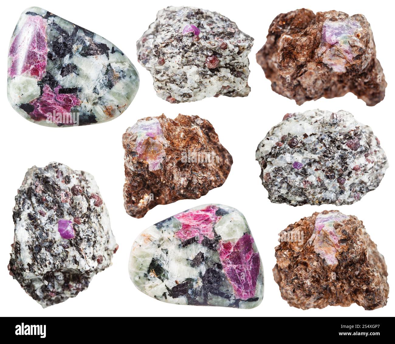 Reihe von verschiedenen natürlichen mineralischen Steinen - Korund Kristall in Felsen isoliert auf weißem Hintergrund Stockfoto