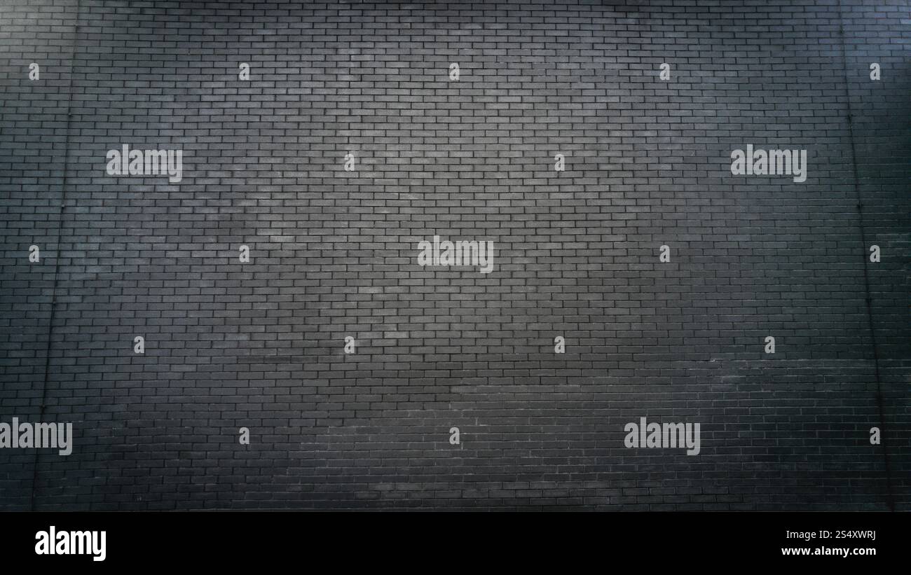 Getönten Foto von großer schwarzer Stein Wand Stockfoto