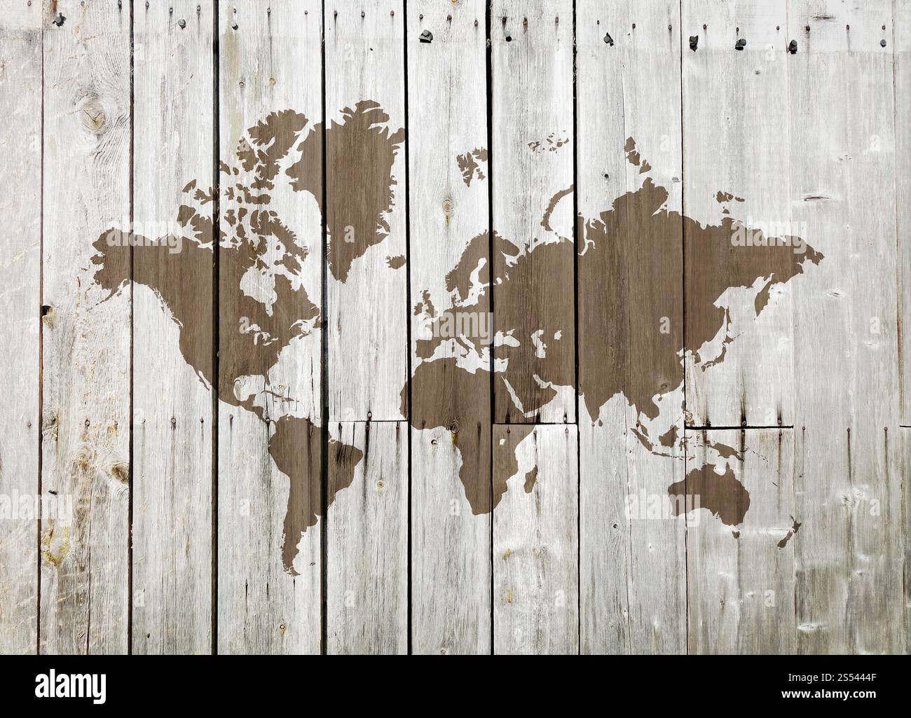 Weltkarte auf einer alten Holzwand. Weltkarte auf einer Holzwand Stockfoto