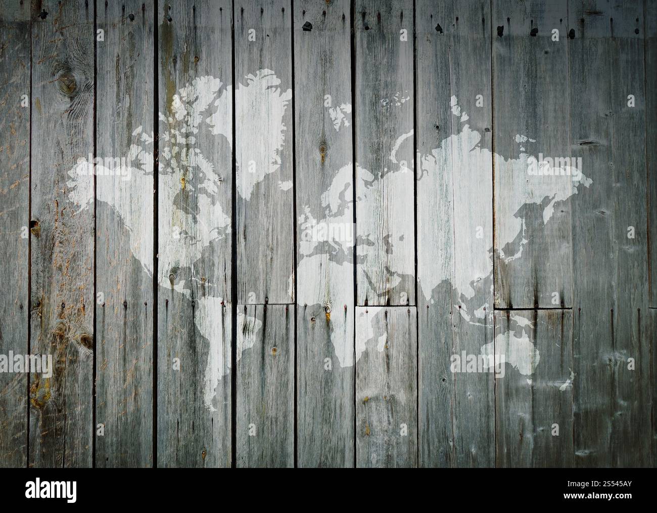 Weltkarte auf einer alten Holzwand. Weltkarte auf einer Holzwand Stockfoto