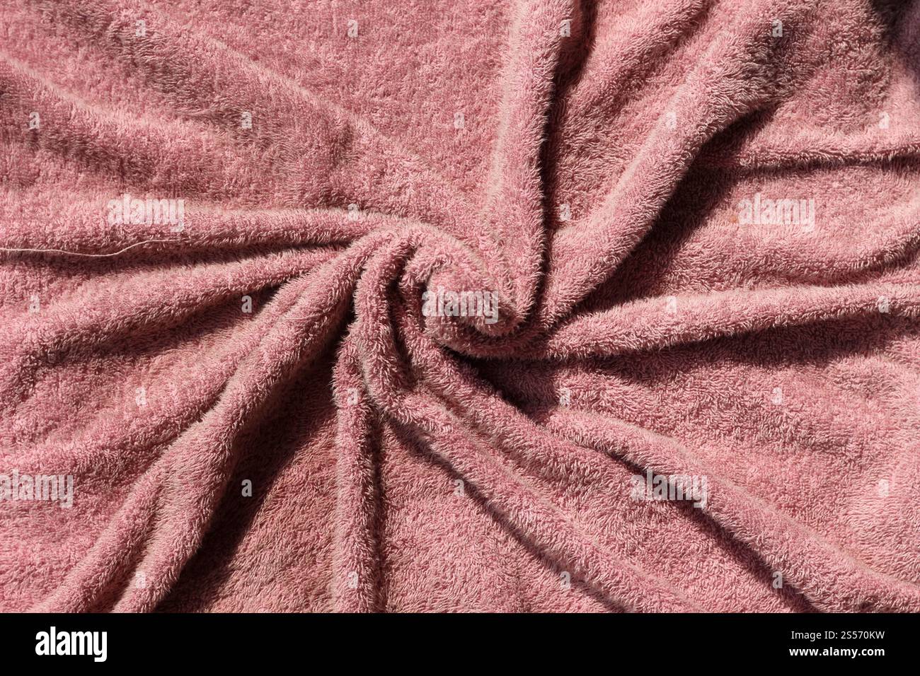 Pinkfarbene Badhandtuchstruktur Stockfoto