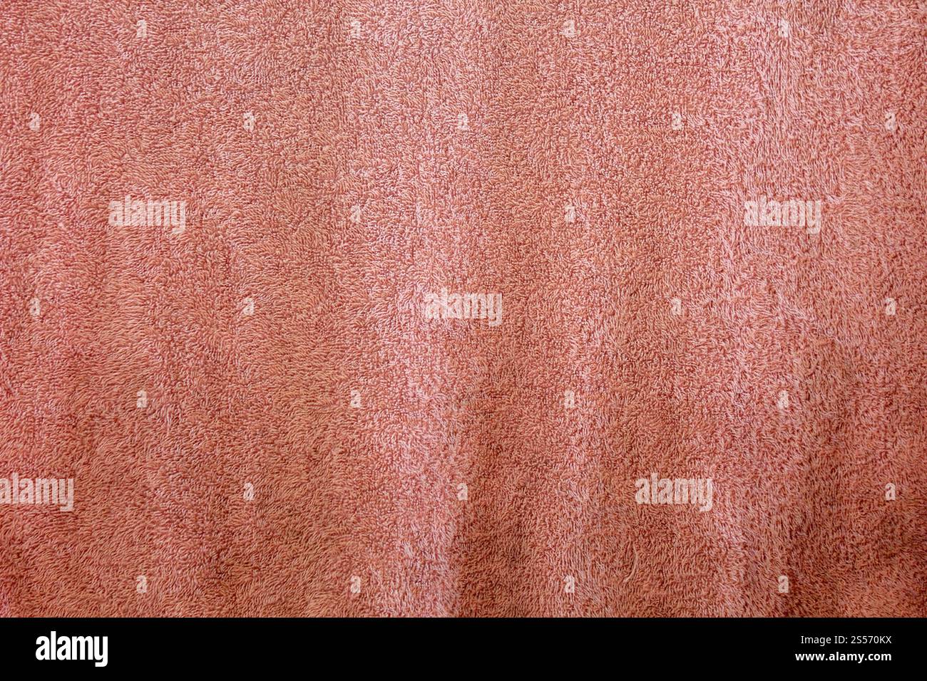Pinkfarbene Badhandtuchstruktur Stockfoto