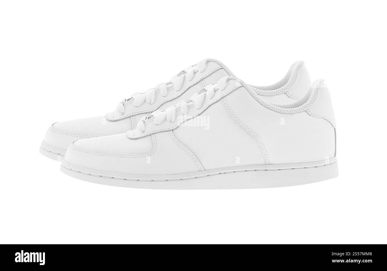 Paar Sportschuhe im Frauenstil isoliert auf weißem Hintergrund. Ein Paar Sportschuhe im Damenstil Stockfoto