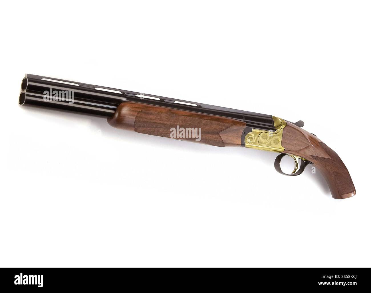 Alte Holzpistole isoliert auf weißem Hintergrund. Alte Holzpistole isoliert auf weiß Stockfoto