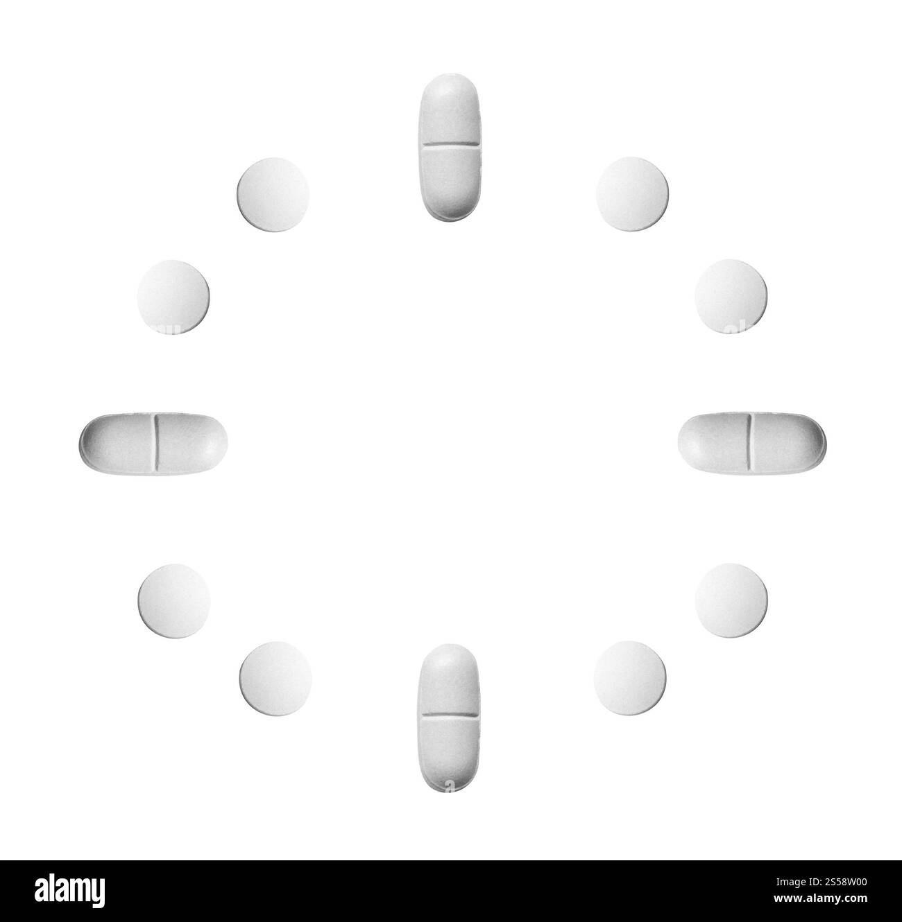 Die Uhr besteht aus weißen Tabletten, die auf weißem Hintergrund isoliert sind. Die Uhr besteht aus weißen Tabletten Stockfoto