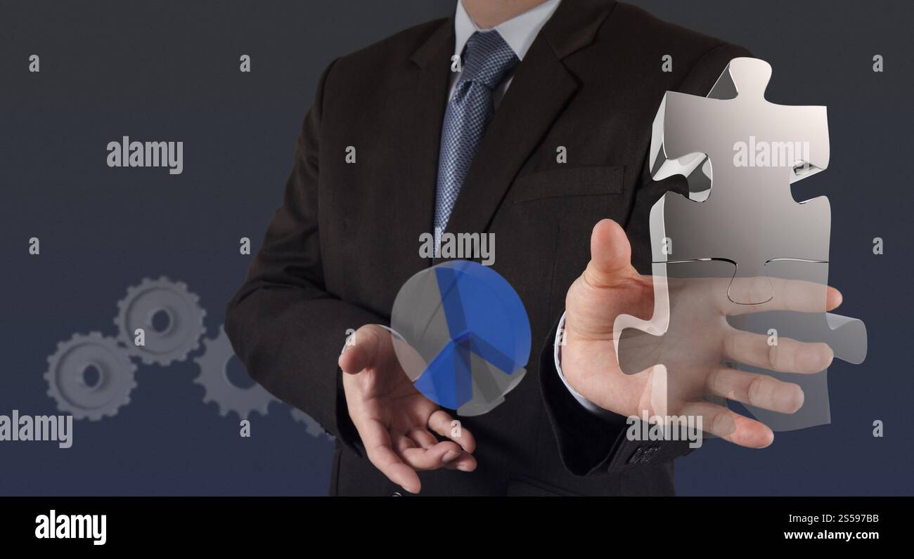 Geschäftsmann Hand zeigt Licht und Puzzle Partnerschaft Stockfoto