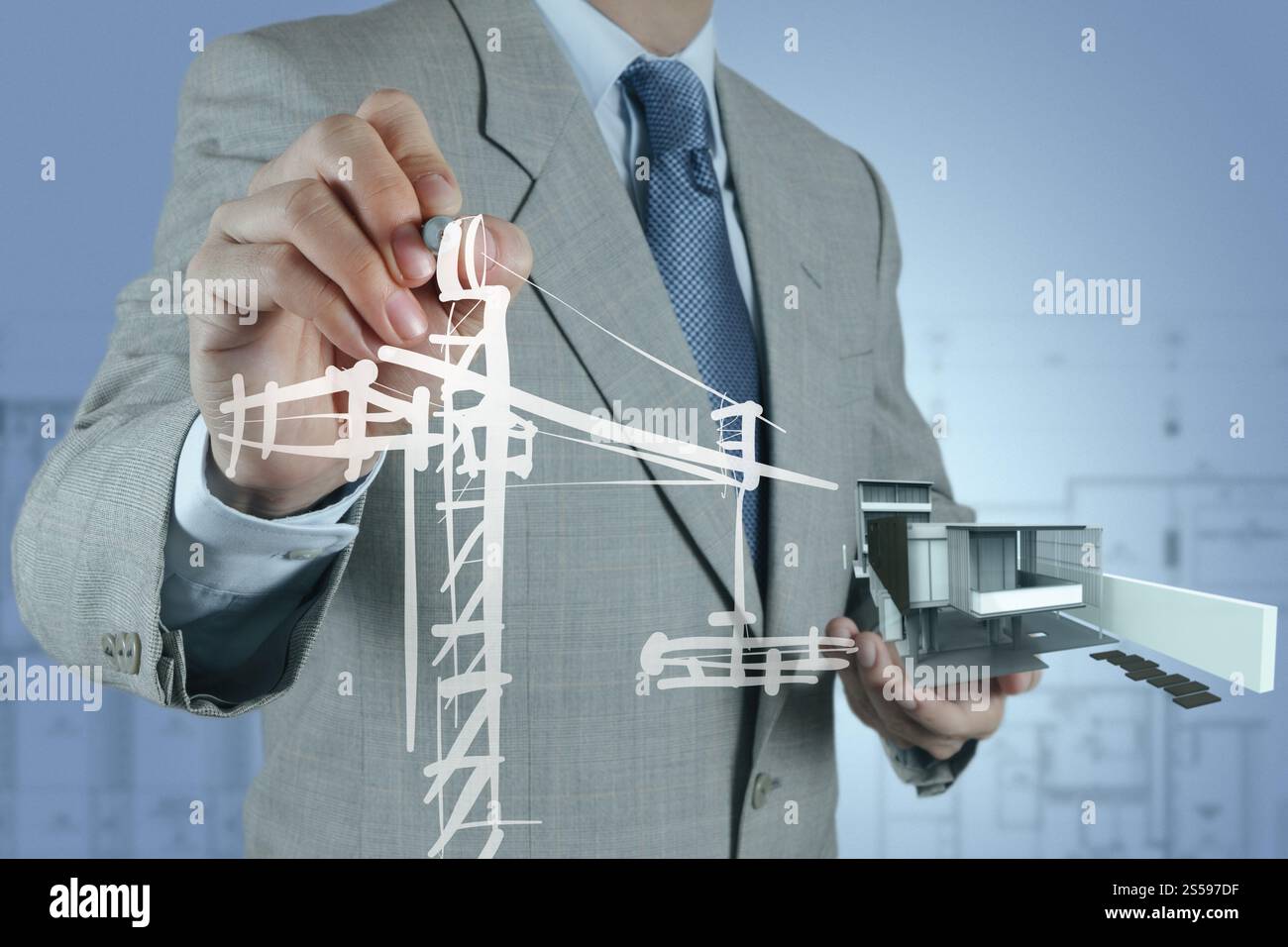 Geschäftsmann zieht Entwicklung Gebäudekonzept Stockfoto