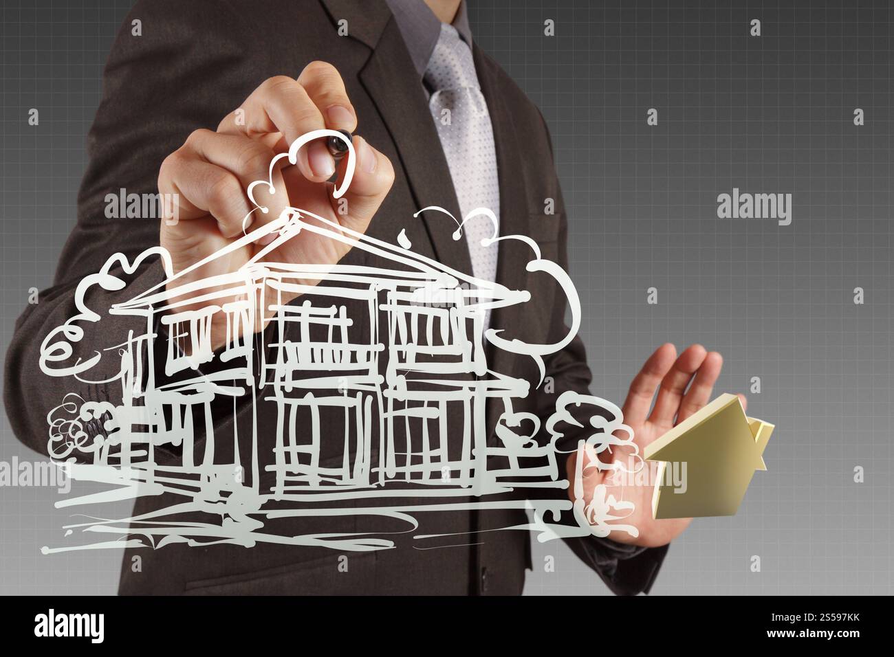 Geschäftsmann zieht Entwicklung Gebäudekonzept Stockfoto