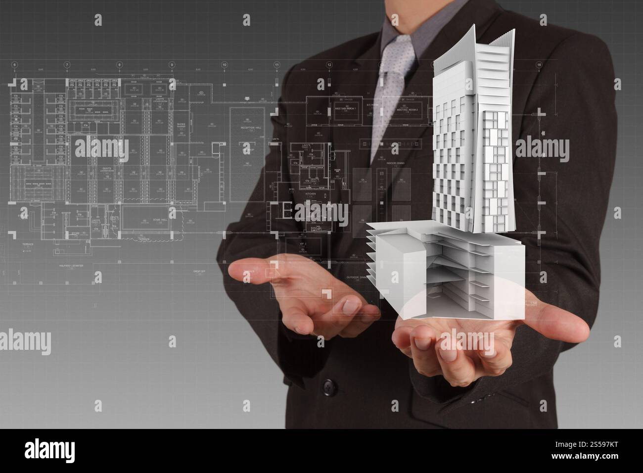 Geschäftsmann zieht Entwicklung Gebäudekonzept Stockfoto