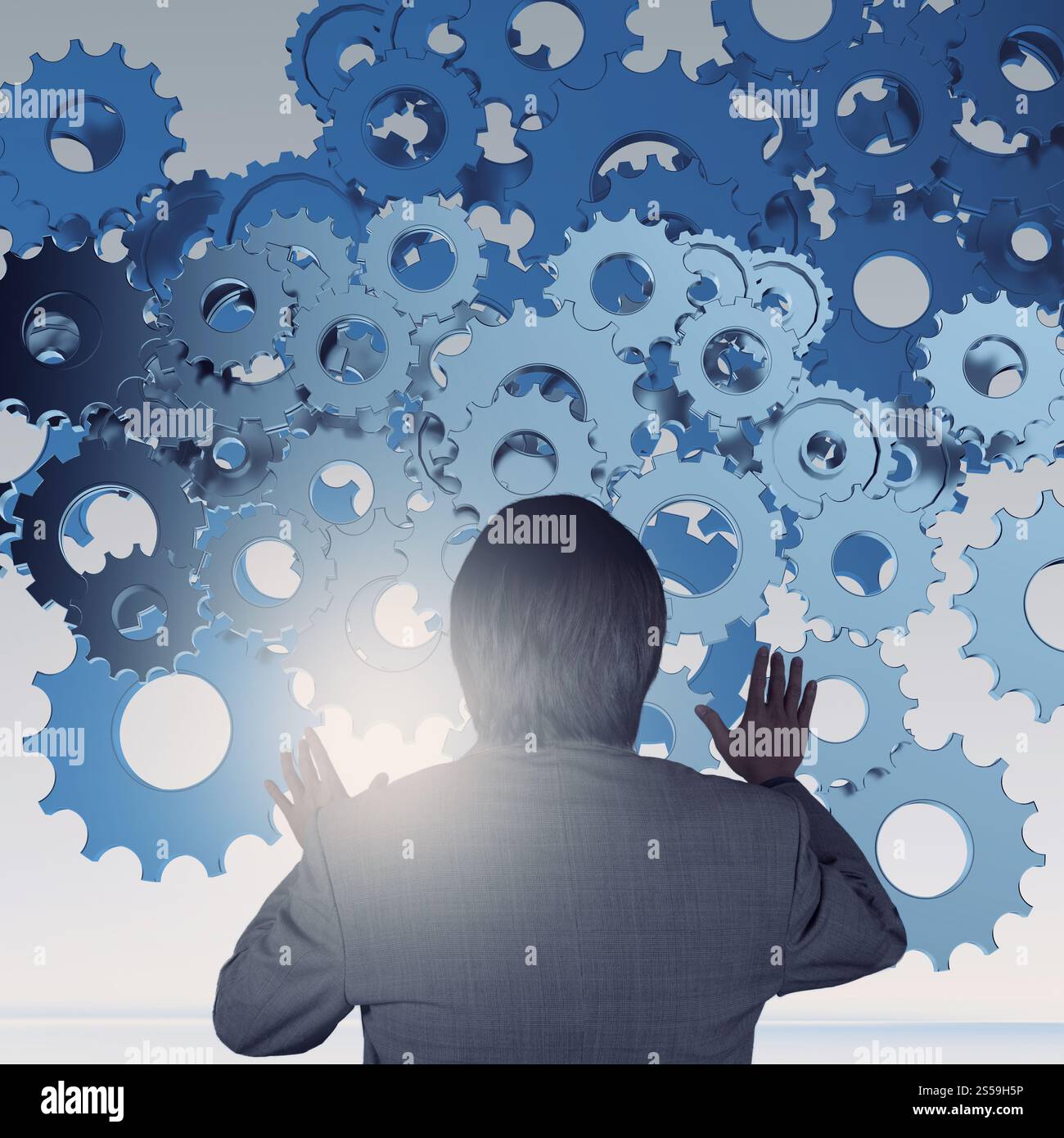 Geschäftsmann, der mit Zahnradgetriebe zum Erfolg als Konzept arbeitet Stockfoto