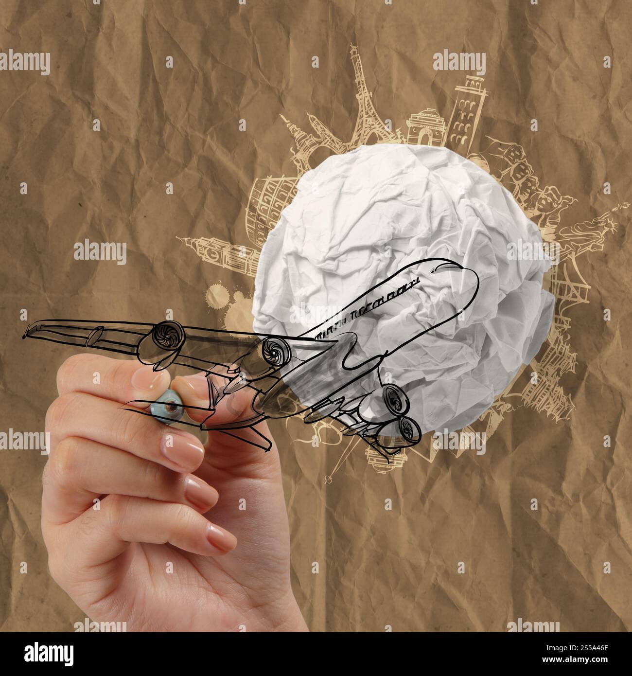 Hand zieht Flugzeug zerknittertes Papier und Reisen auf der ganzen Welt als Vintage-Stil-Konzept Stockfoto