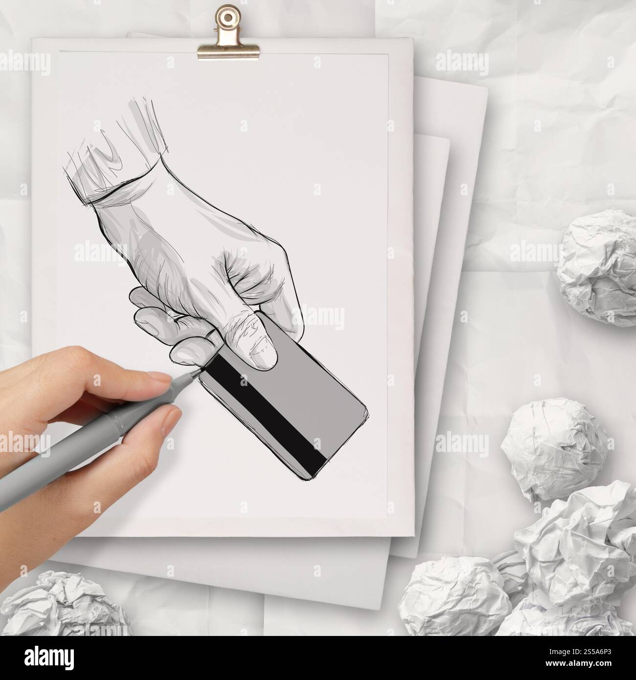 handgezeichnete Hand hochhalten Kreditkarte auf Buch Stapelkonzept Hintergrund Stockfoto