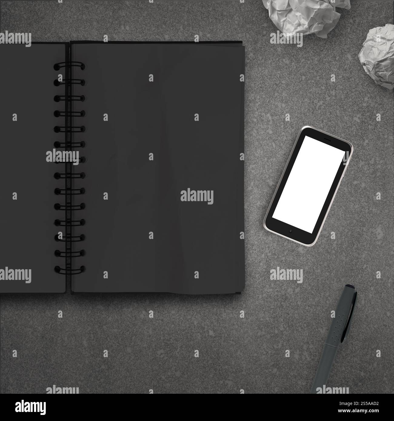 leere 3d Handy mit leeren Notizbuch auf steinernen Schreibtisch als Konzept Stockfoto