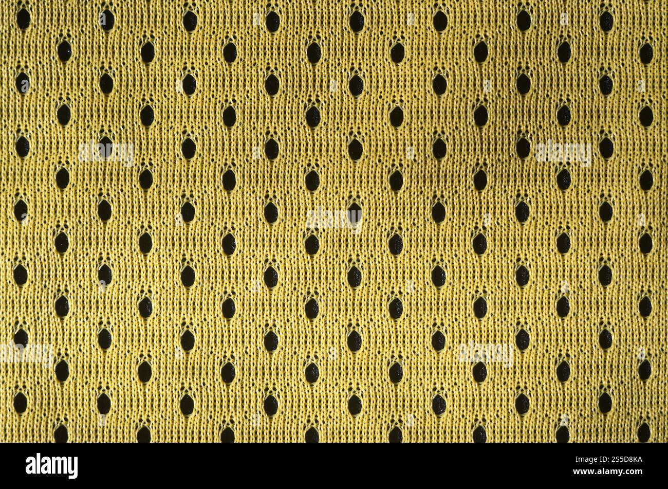 In der Nähe der gelb Polyester nylon Gelb sportswear Shorts erstellt einen strukturierten Hintergrund Stockfoto