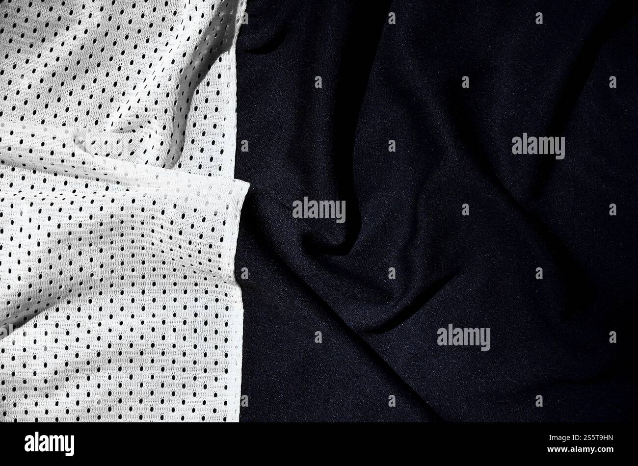 Sport Bekleidung Stoff Textur Hintergrund, Blick von oben auf die textile Oberfläche mit einem weißen Tuch Stockfoto