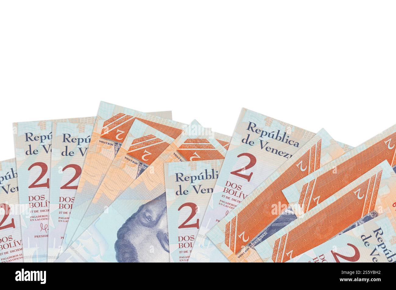 2 venezolanische bolivar-Scheine liegen auf der Unterseite des Bildschirms isoliert auf weißem Hintergrund mit Kopierraum. Hintergrundbanner-Vorlage für Unternehmen Stockfoto