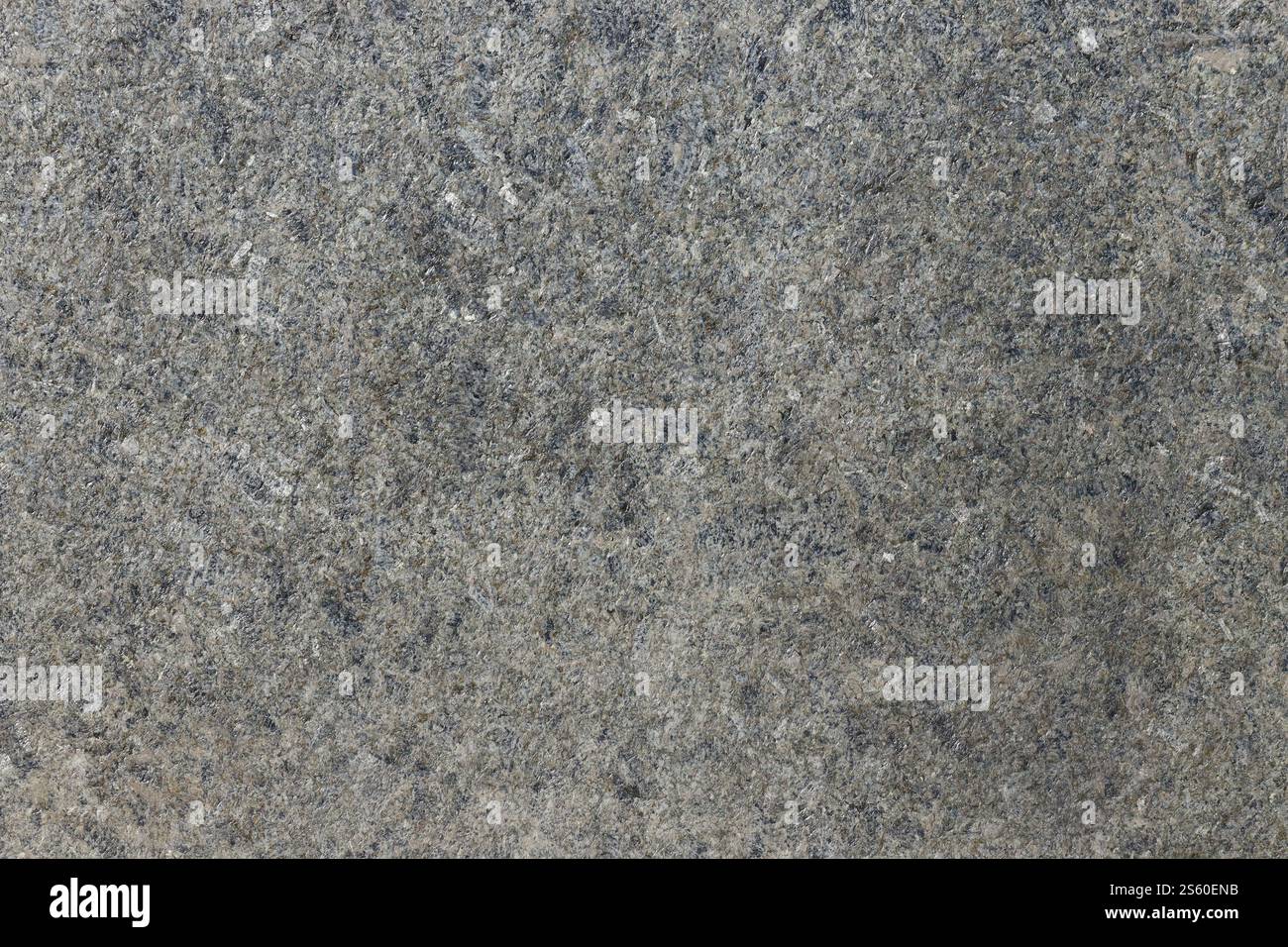 Grau schimmernder Hintergrund-Imitationsstaub mit glänzenden Kugeln. Abstrakte Muster-Pailletten. Schablone runde Partikel. Frischer Asphalt, Granit oder Marmor Stockfoto