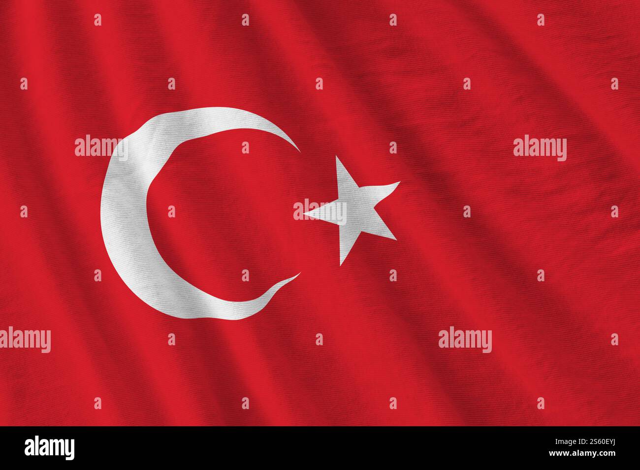 Truthahnfahne mit großen Falten, die dicht oben unter dem Studiolicht winken. Die offiziellen Symbole und Farben im Stoffbanner. Truthahnflagge mit großer Stockfoto