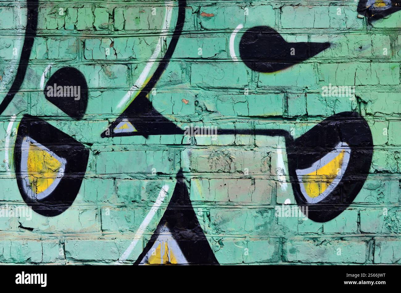 Kunst unter dem Boden. Wunderschöner Street Art Graffiti Stil. Die Wand ist mit abstrakten Zeichnungen mit Hausfarbe dekoriert. Moderne, kultige urbane Kultur von Stockfoto