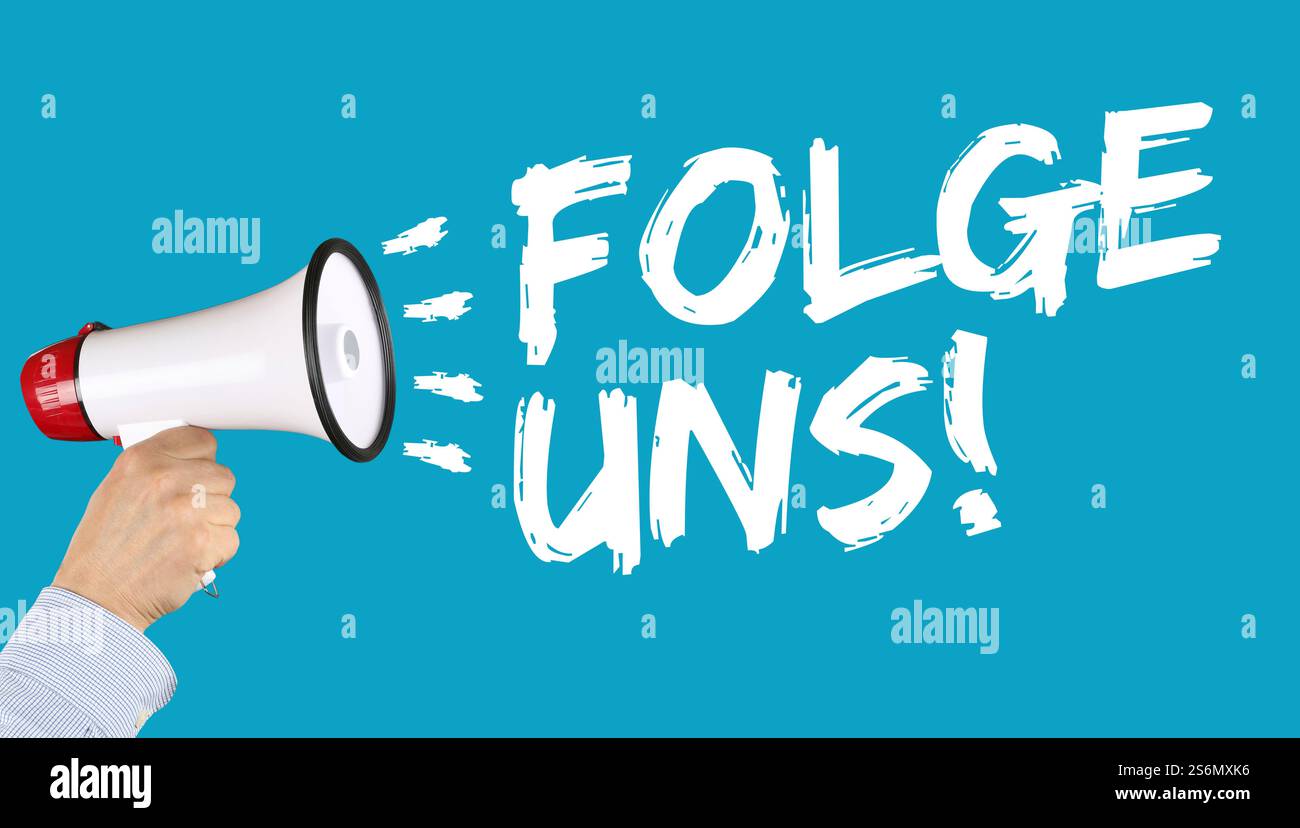 Folgen Sie uns Internet soziale Netzwerke soziale Netzwerke Computer Hand mit Megaphon Stockfoto