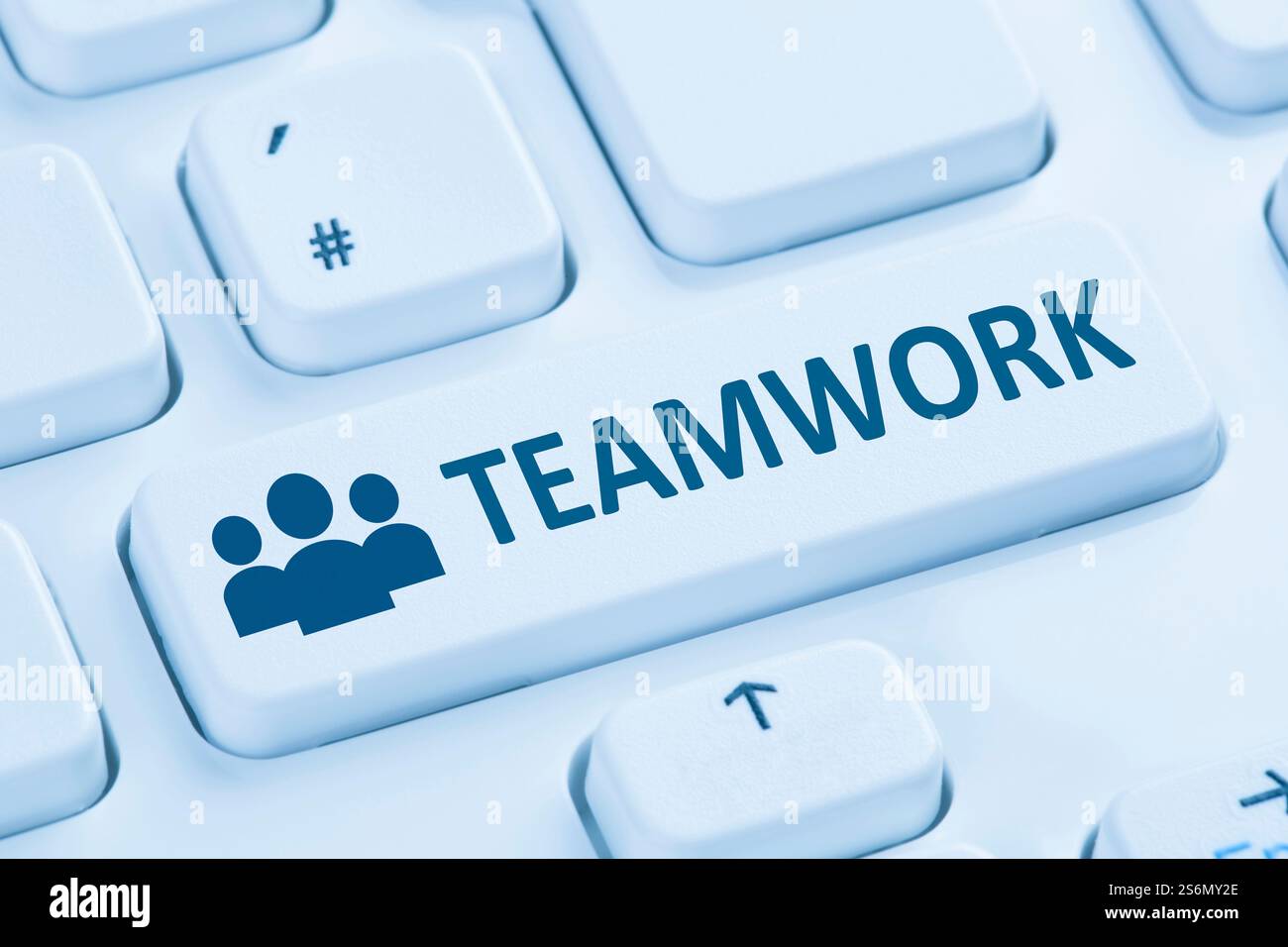 Teamwork Business Team Online-Internet-Symbol blaue Computertastatur Stockfoto