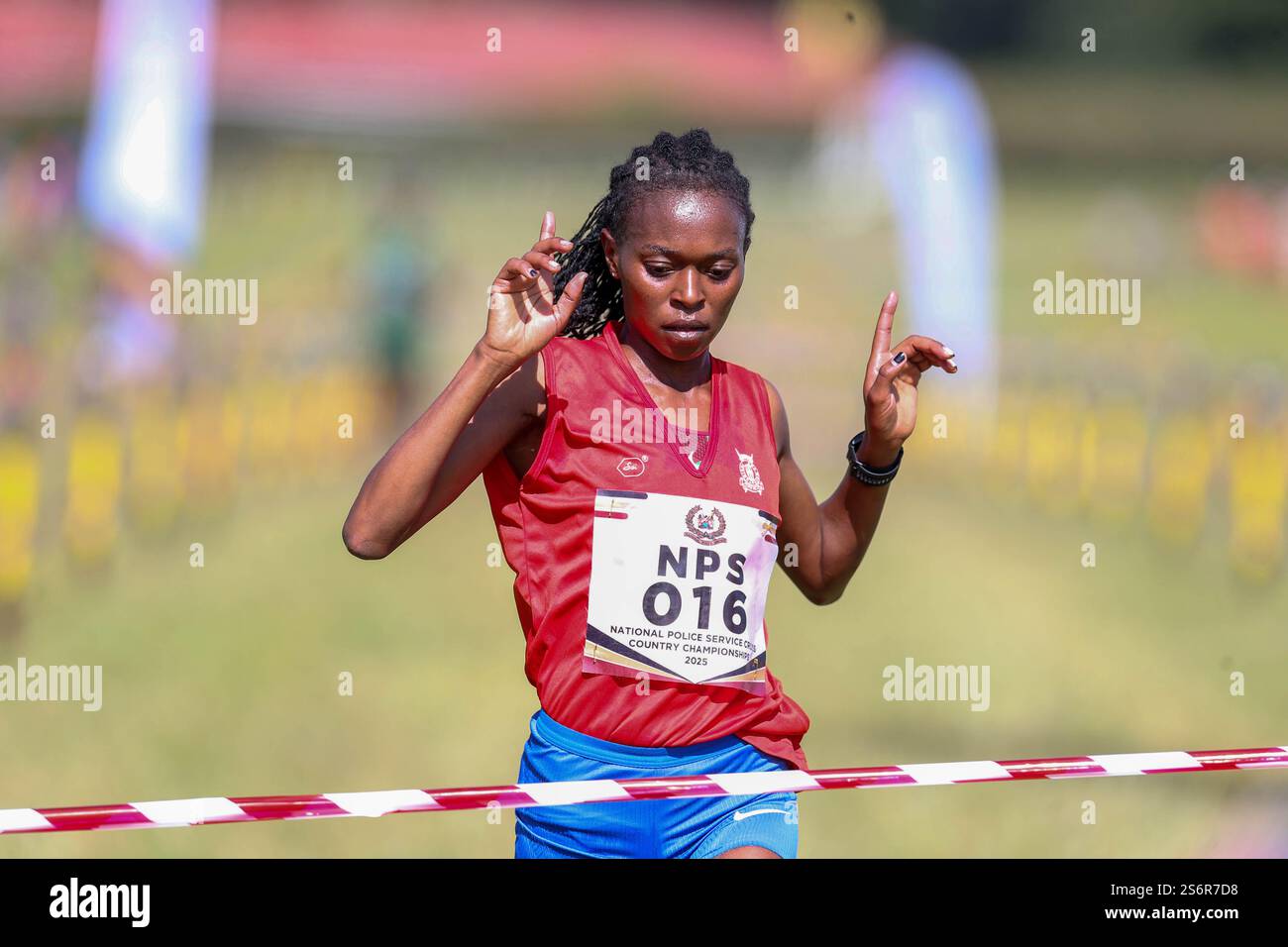 Sheila Chelagat feiert am 17. Januar 2025 beim National Police Cross Country Championsh die 10 km lange Ziellinie für ältere Frauen Stockfoto
